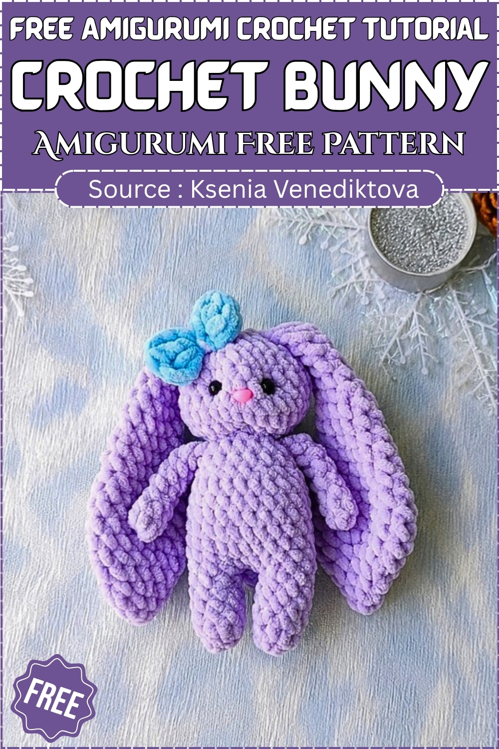 Finished plush Crochet Baylie the Bunny made with soft bluish grey chenille yarn.