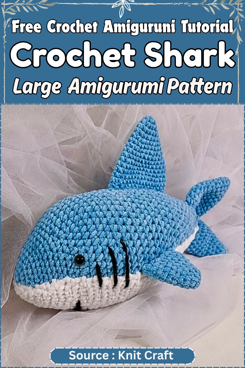 Promotional graphic for a free large crochet shark amigurumi pattern showing the completed blue and white stuffed shark on a white tulle background.