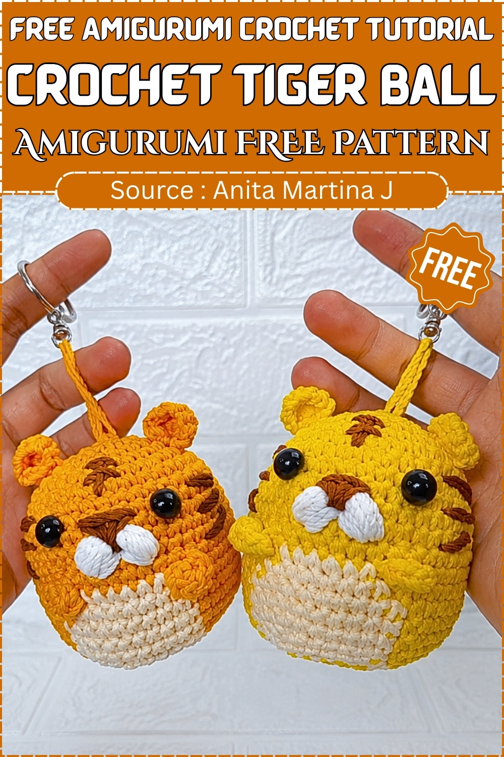 Two orange and yellow crochet tiger ball keychains held in hands against a white brick background with pattern title text overlay.