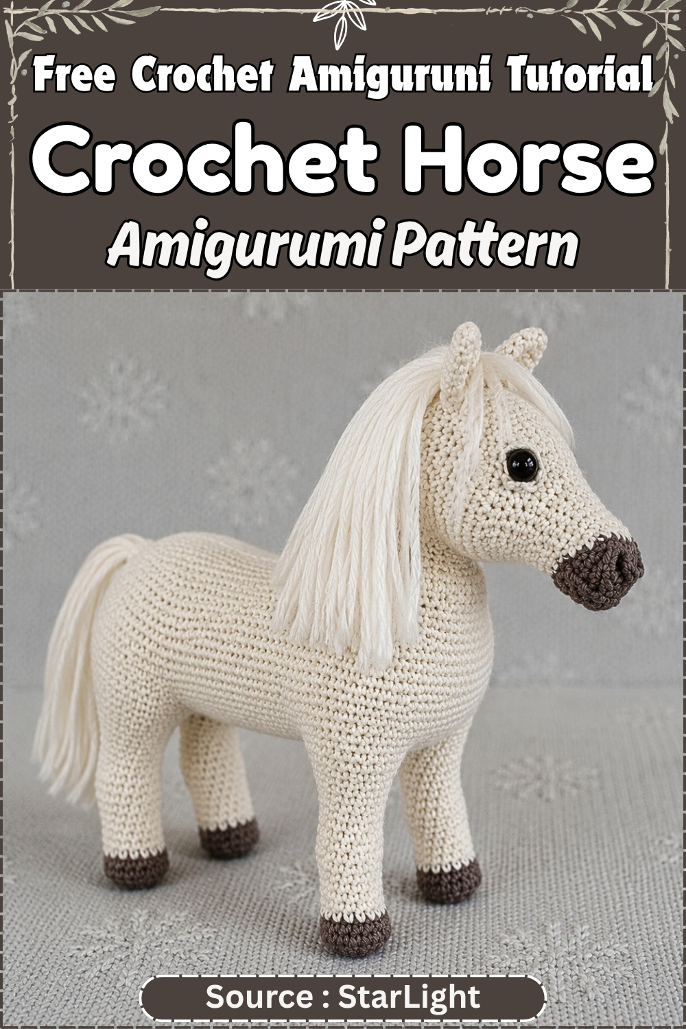 Hands flattening and closing a small crocheted horse ear through both layers using a yarn needle on a grey surface.